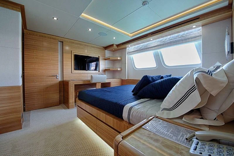 a bed in a room aboard UAQ 1 Yacht for Sale