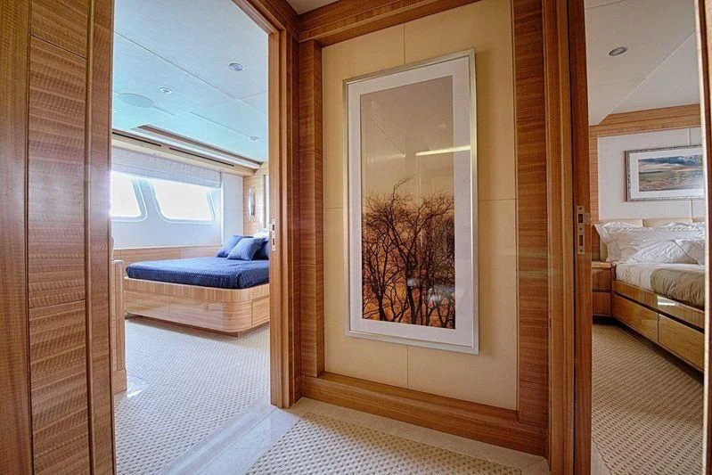 a room with a bed and a window aboard UAQ 1 Yacht for Sale