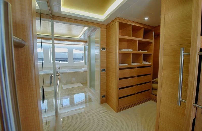 a room with a closet and a slide aboard UAQ 1 Yacht for Sale