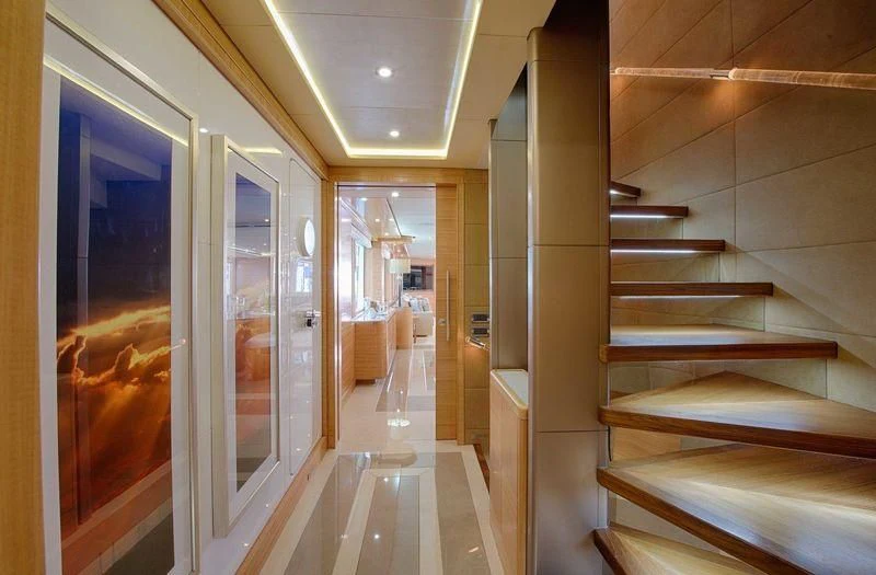 a hallway with a glass door aboard UAQ 1 Yacht for Sale