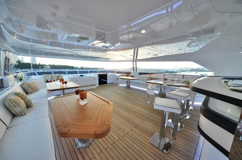 a room with a large window and a view of the water aboard UAQ 1 Yacht for Sale