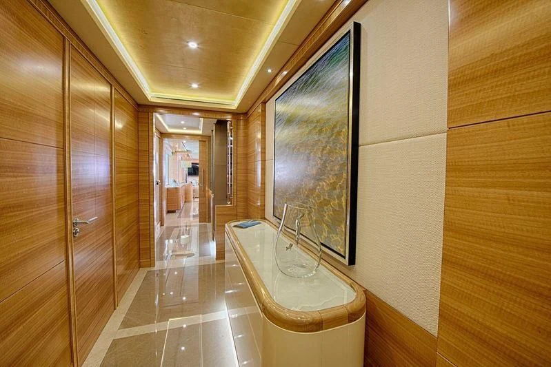 a bathroom with a glass shower aboard UAQ 1 Yacht for Sale