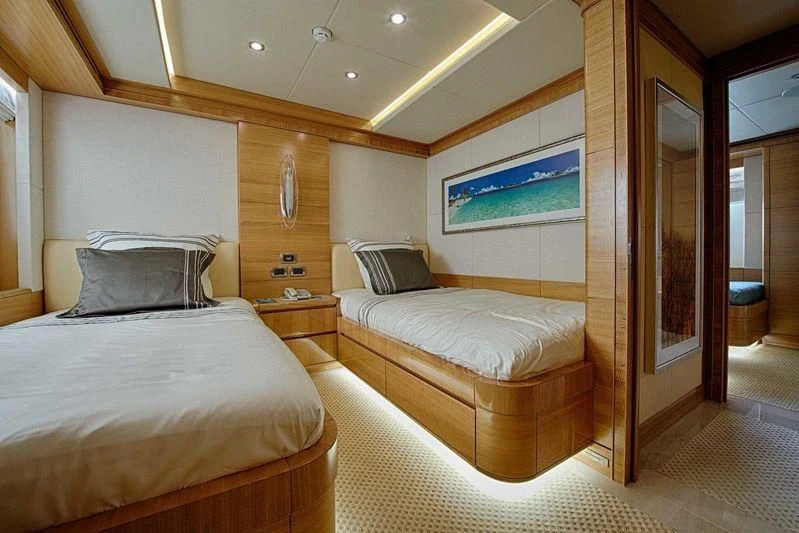 a room with two beds aboard UAQ 1 Yacht for Sale