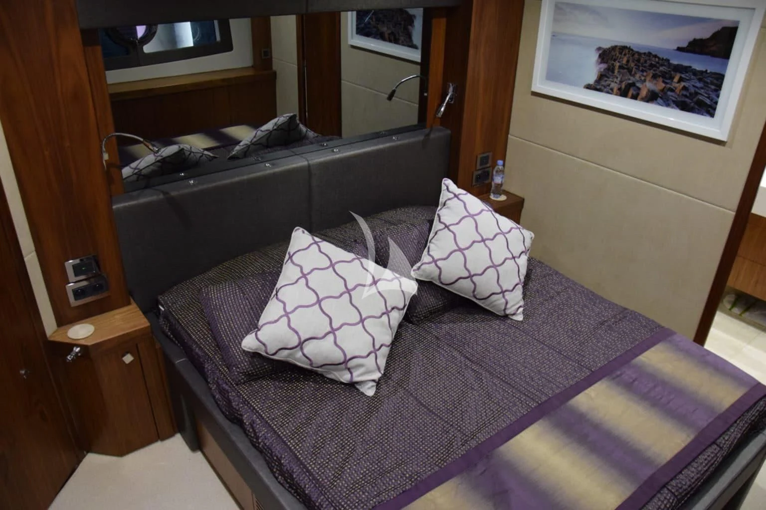 a bed with pillows aboard RAY 3 Yacht for Sale