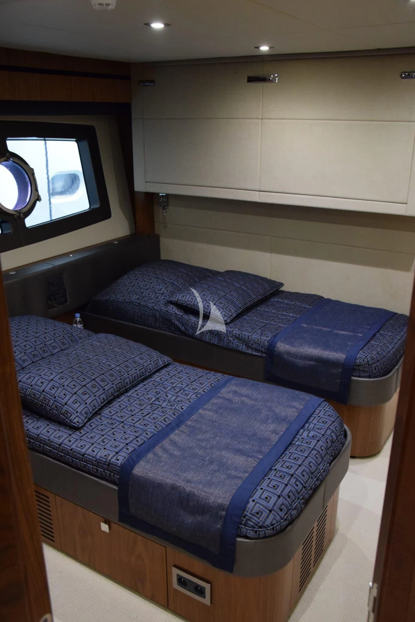 a bed in a room aboard RAY 3 Yacht for Sale