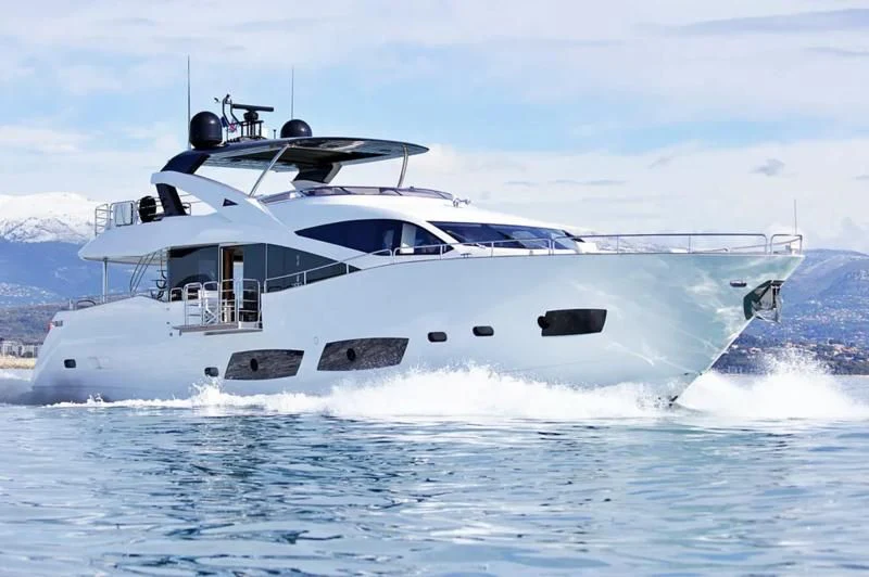 a white yacht in the water aboard RAY 3 Yacht for Sale