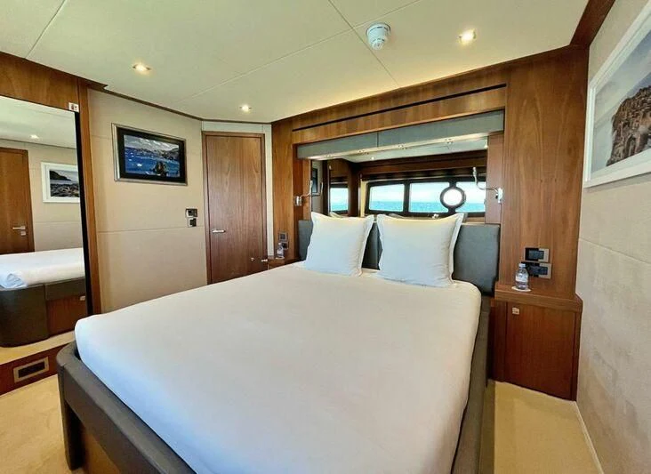 a bed in a room aboard RAY 3 Yacht for Sale