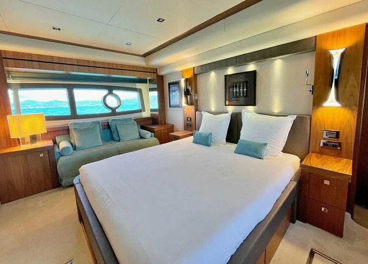 a bed and a couch in a room aboard RAY 3 Yacht for Sale