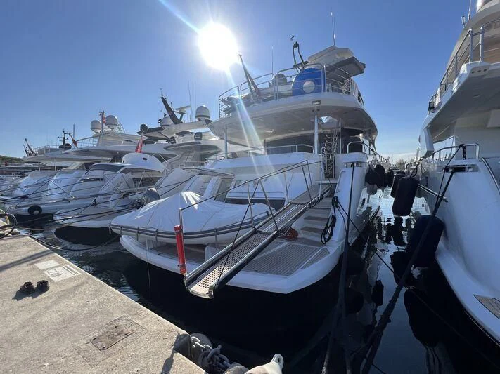 a boat docked at a pier aboard RAY 3 Yacht for Sale