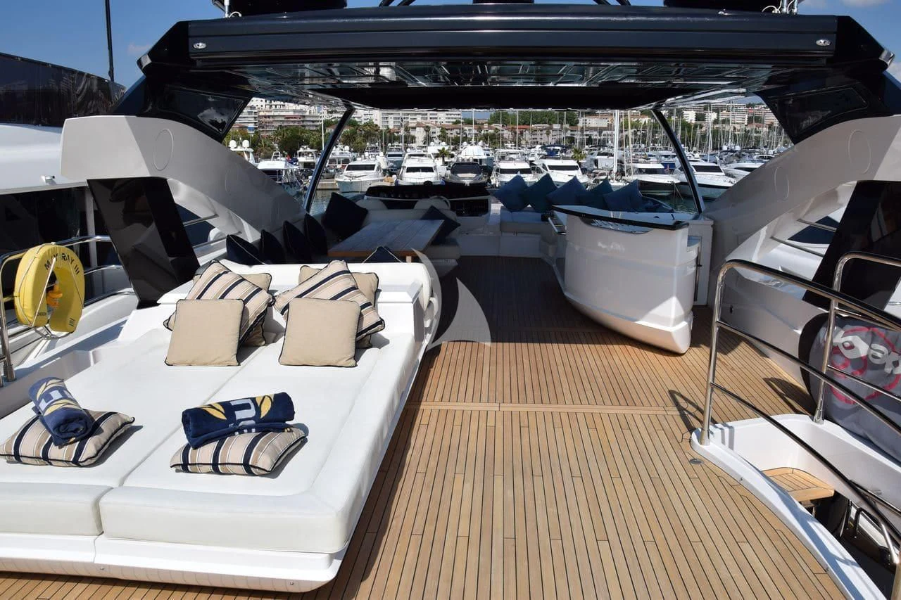 a deck with a deck and a boat on it aboard RAY 3 Yacht for Sale