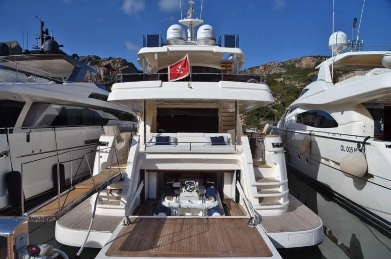 a group of boats are parked in a harbor aboard BLESSED ONE Yacht for Sale