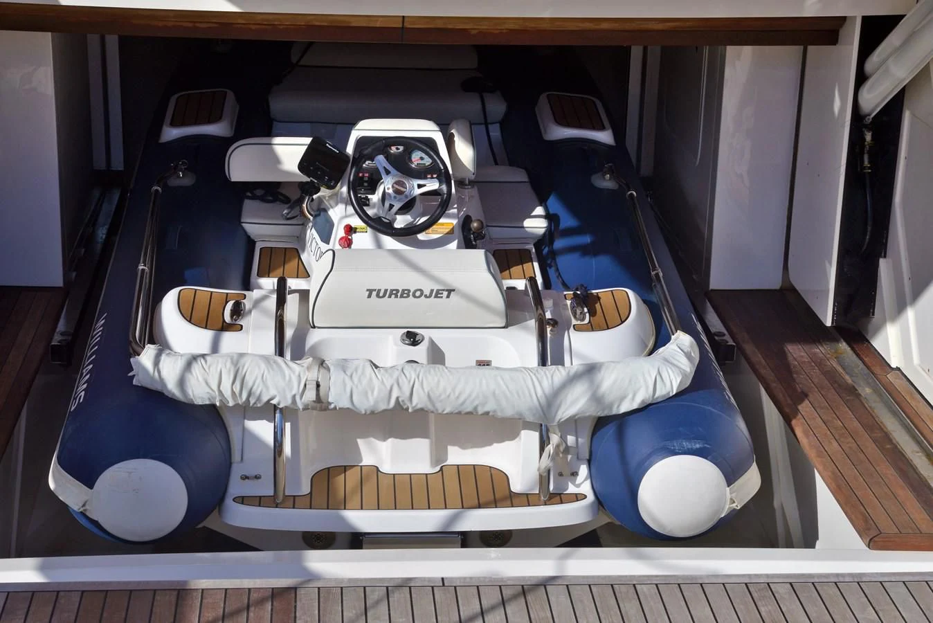a white and blue baby seat aboard BLESSED ONE Yacht for Sale