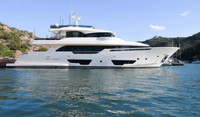 a white yacht in the water aboard BLESSED ONE Yacht for Sale