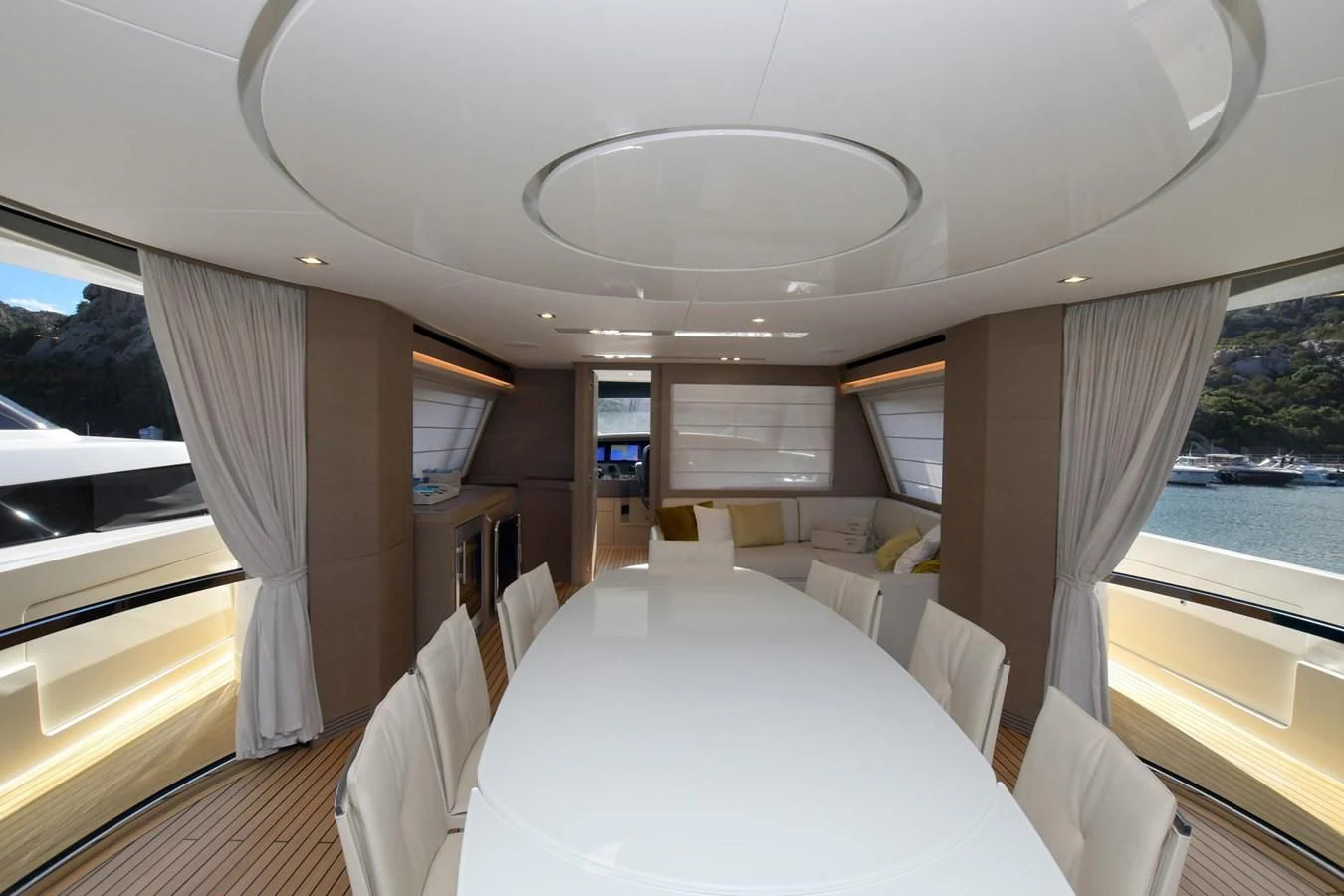 a room with a table and chairs aboard BLESSED ONE Yacht for Sale