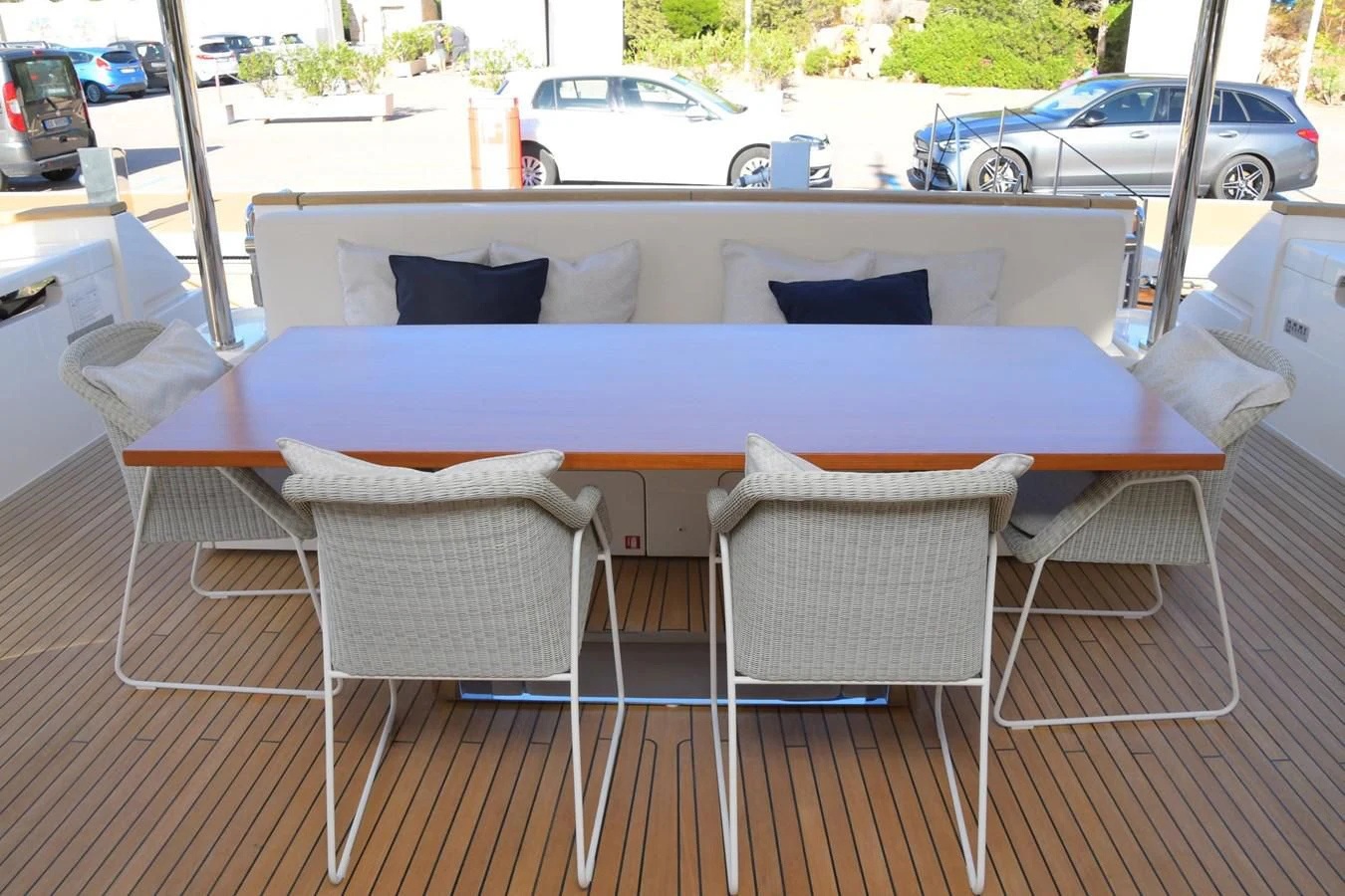 a table and chairs on a deck aboard BLESSED ONE Yacht for Sale