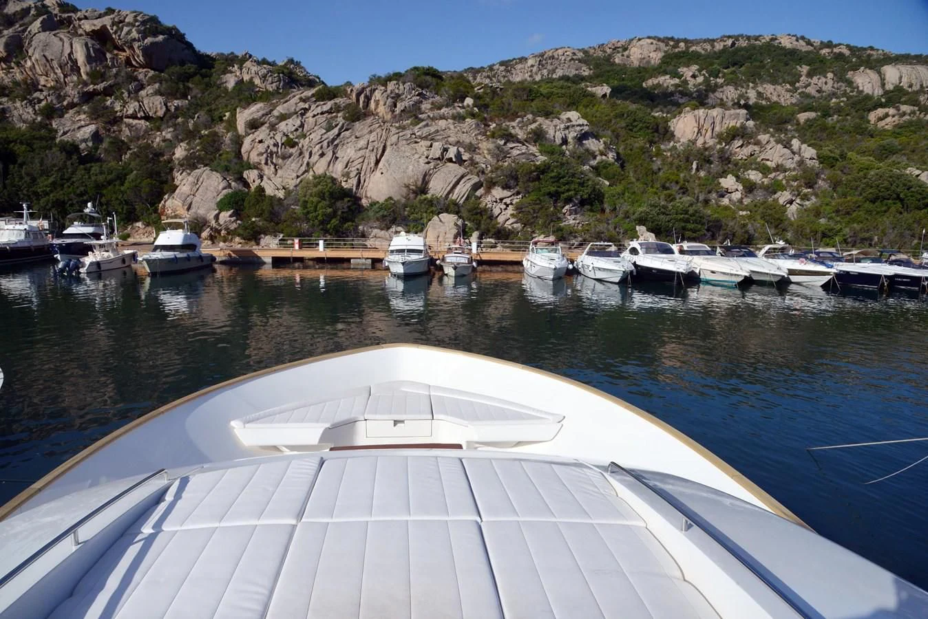 a boat dock with boats aboard BLESSED ONE Yacht for Sale