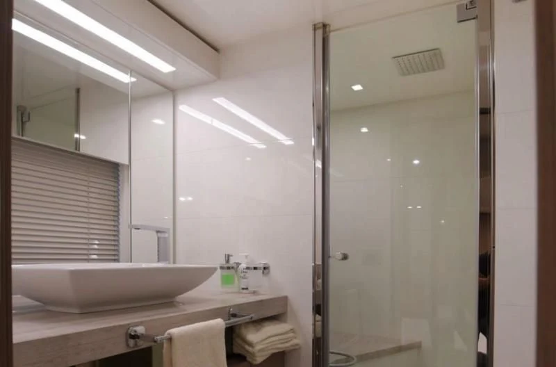 a bathroom with a glass shower aboard BLESSED ONE Yacht for Sale