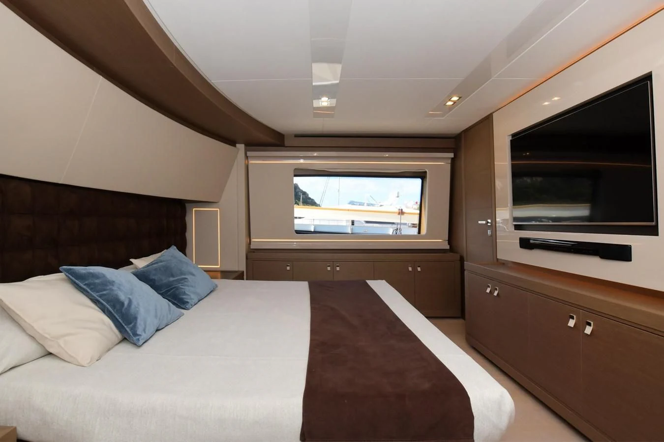 a bed in a room aboard BLESSED ONE Yacht for Sale