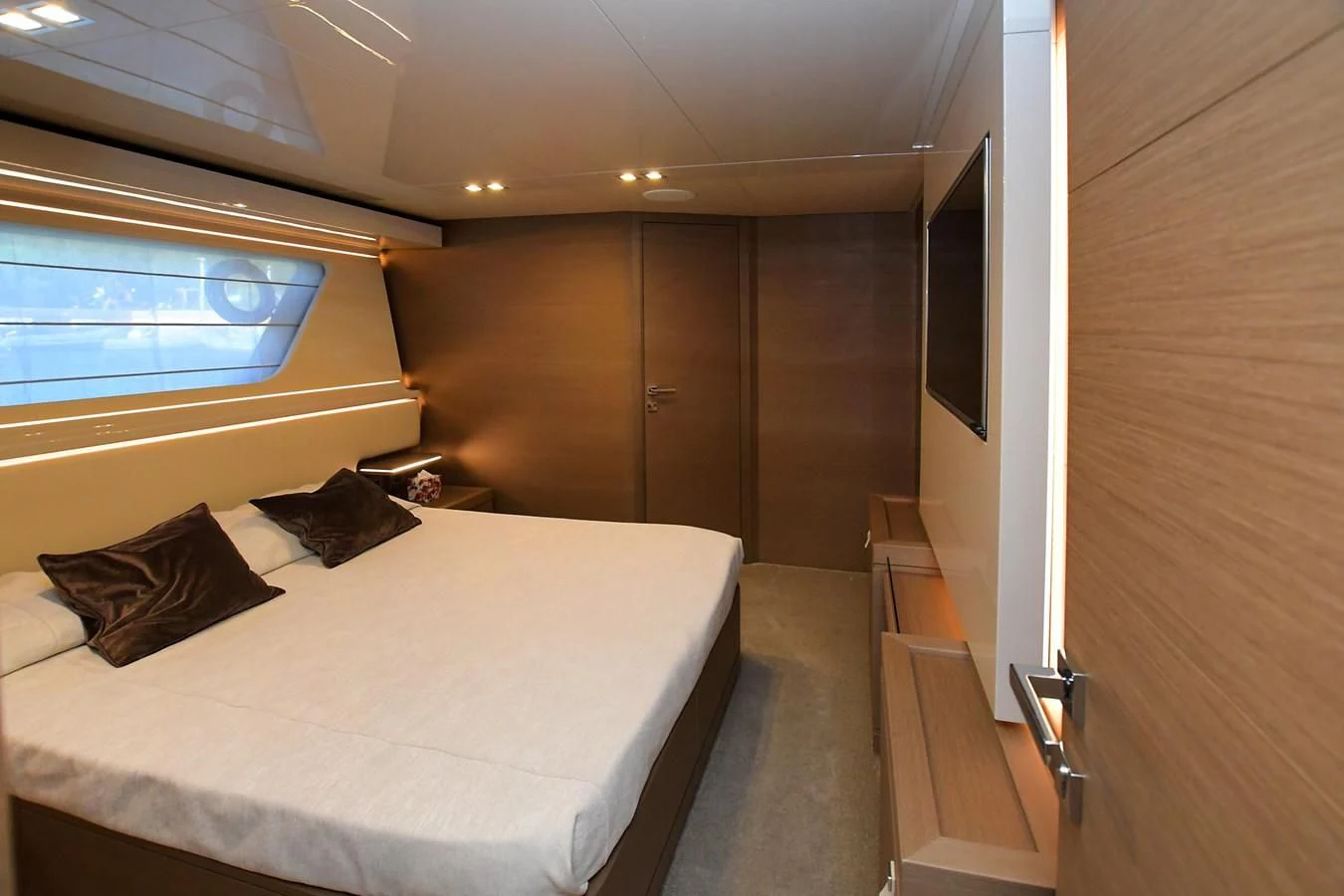 a bed in a room aboard BLESSED ONE Yacht for Sale