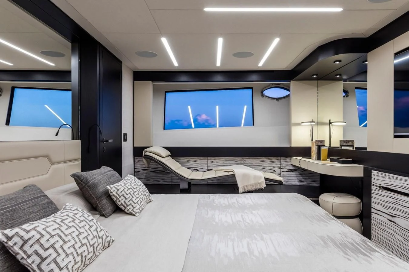 a large bed in a room aboard PERSHING 8X Yacht for Sale