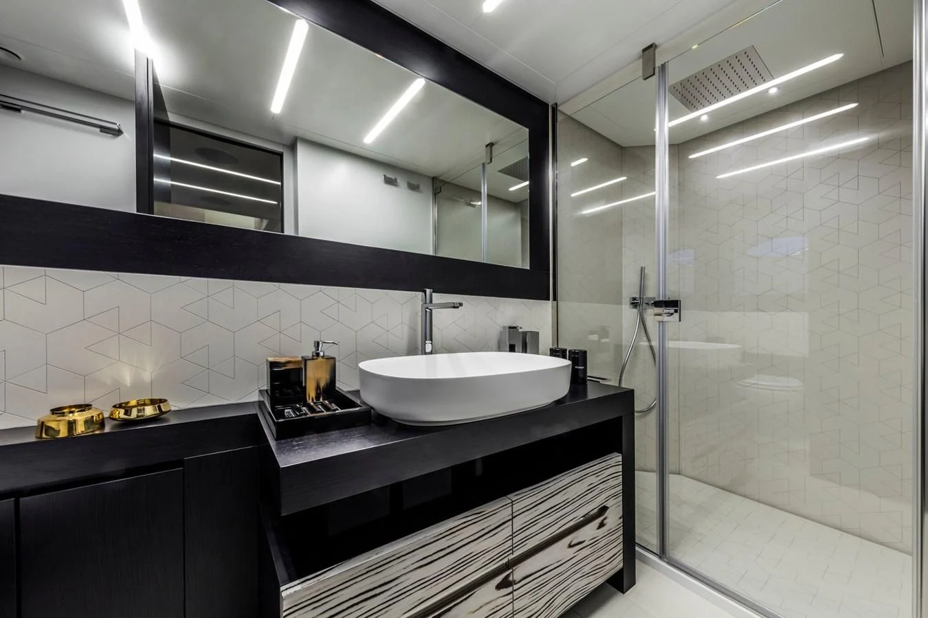 a bathroom with a sink and a shower unit aboard PERSHING 8X Yacht for Sale