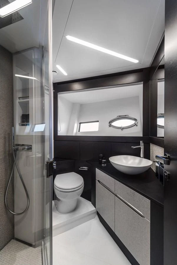 a bathroom with a sink and a toilet aboard PERSHING 8X Yacht for Sale
