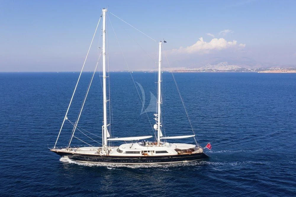 a white sailboat on the water aboard XASTERIA Yacht for Charter