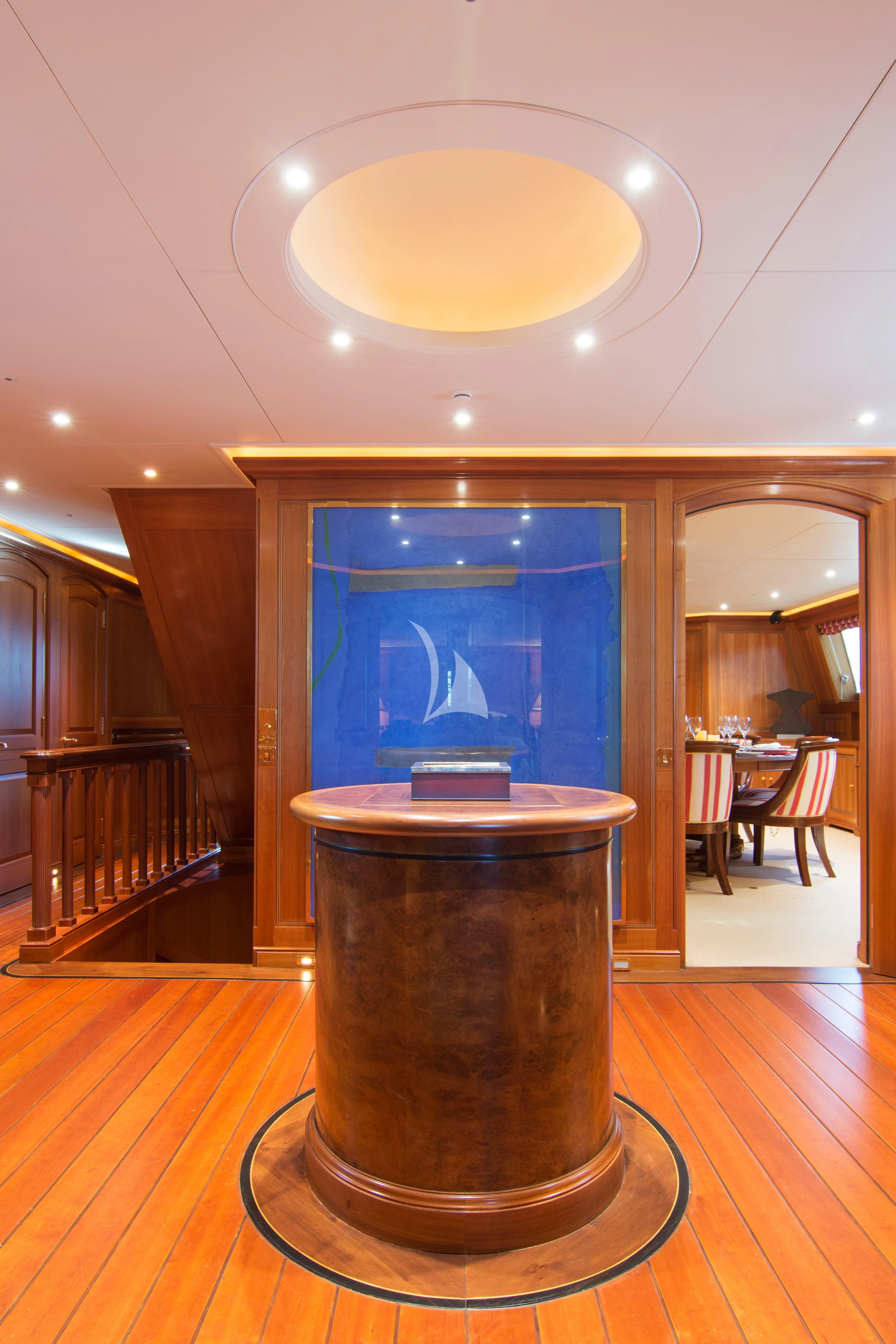 a large glass display in a room aboard XASTERIA Yacht for Charter