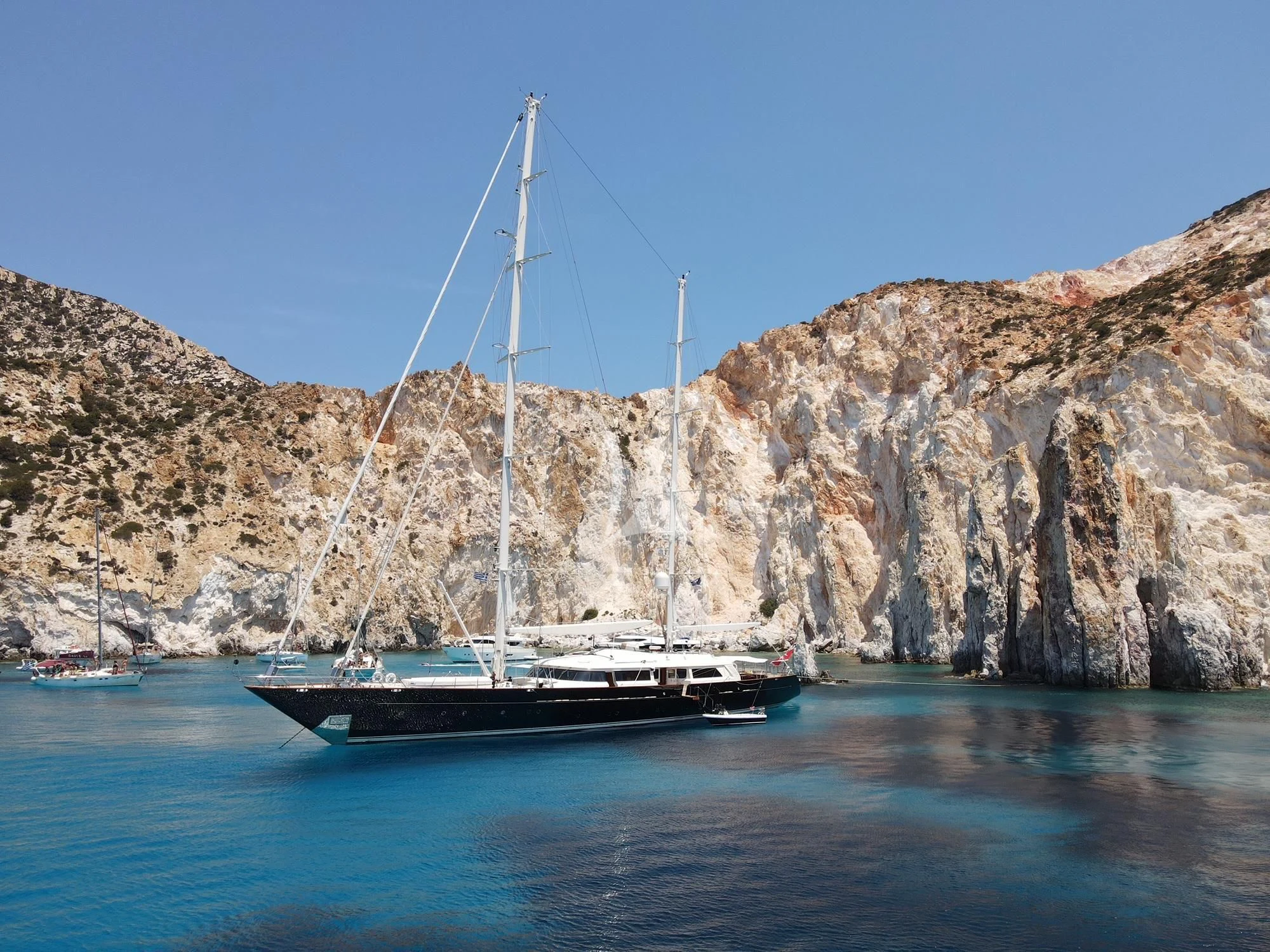 a boat sailing on the water aboard XASTERIA Yacht for Charter