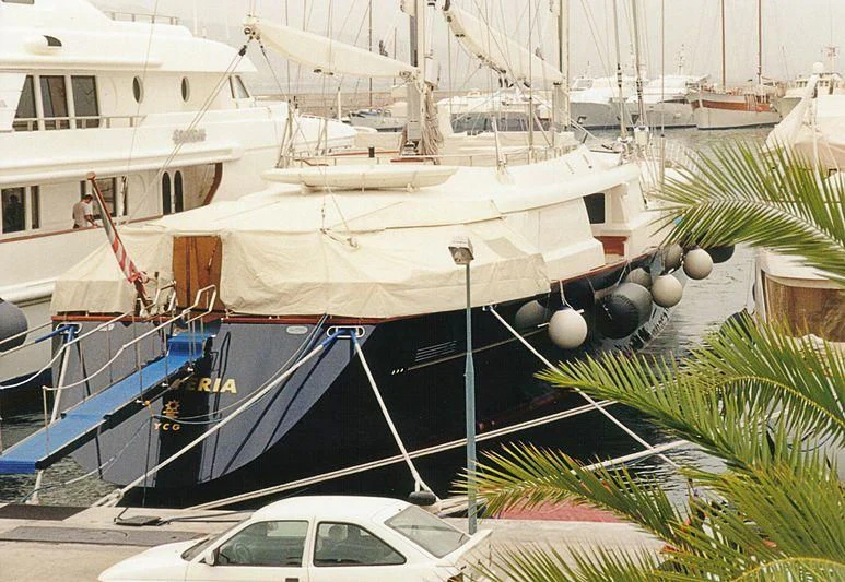 a boat docked at a pier aboard XASTERIA Yacht for Charter