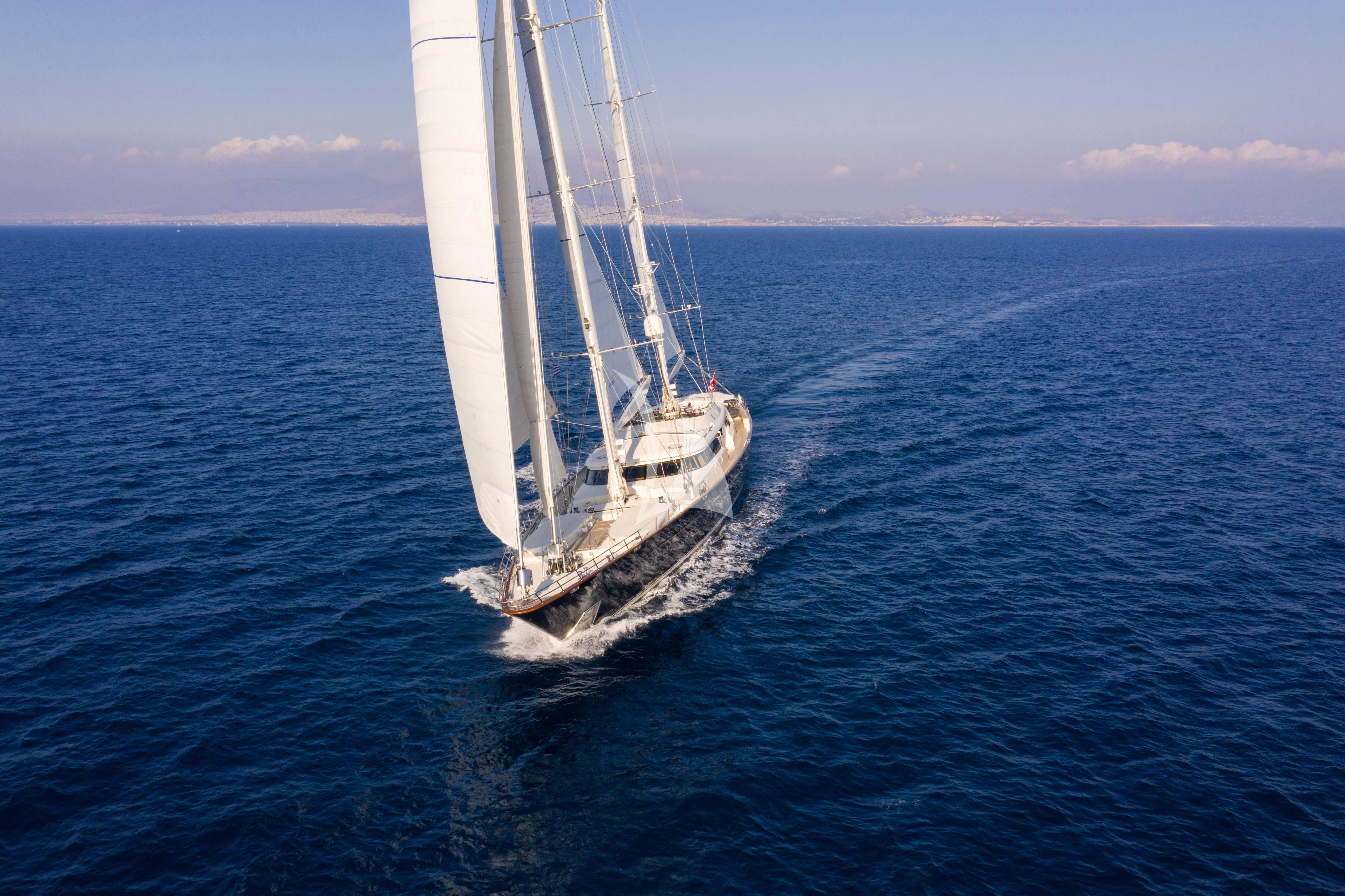 a sailboat in the water aboard XASTERIA Yacht for Charter