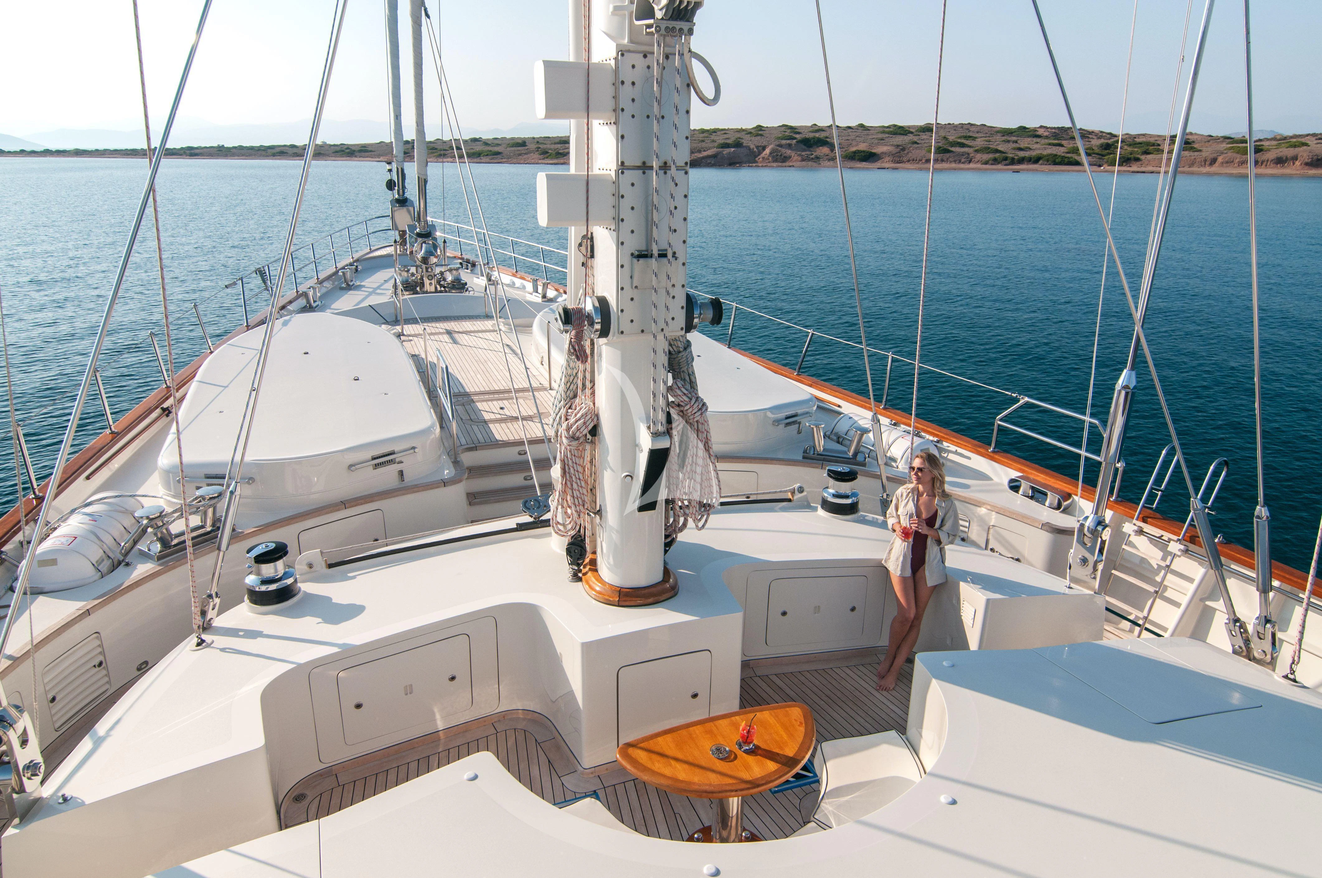 a couple people on a boat aboard XASTERIA Yacht for Charter