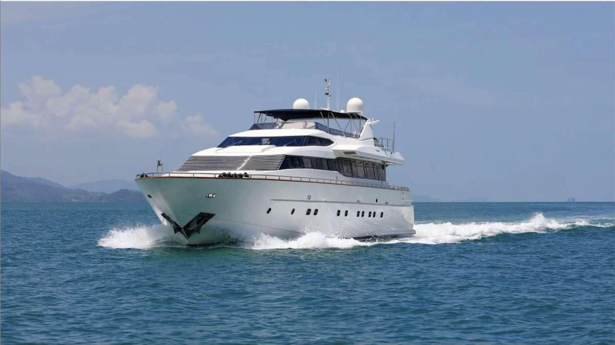 a large white boat on the water aboard DEMAREST Yacht for Sale