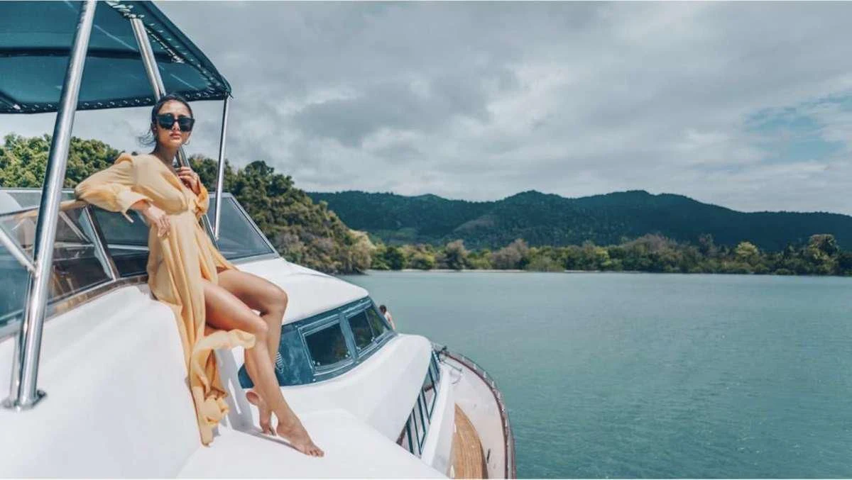 a person sitting on a boat aboard DEMAREST Yacht for Sale