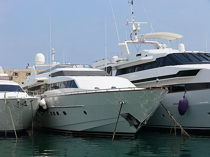 several boats docked in a harbor aboard DEMAREST Yacht for Sale