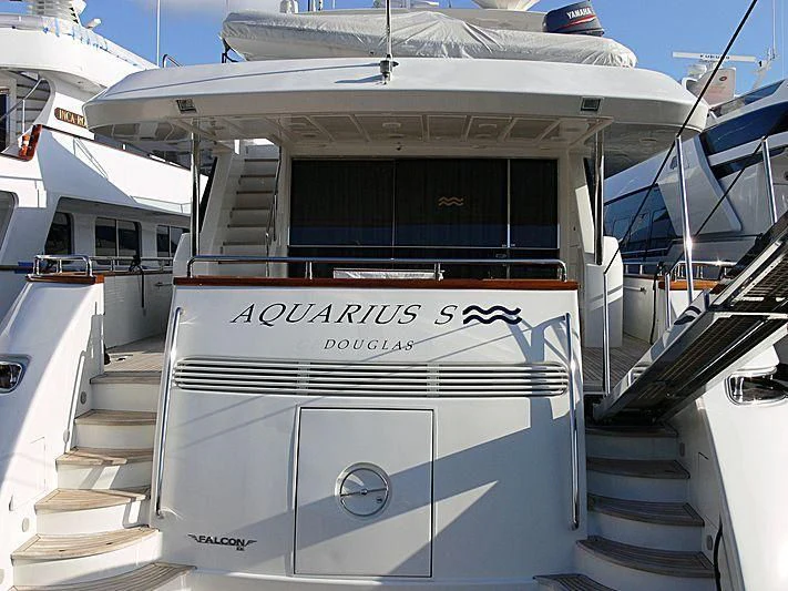 a boat with a sign on the front aboard DEMAREST Yacht for Sale