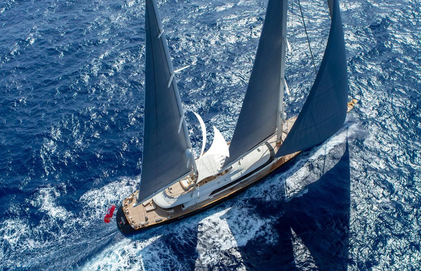 a space shuttle flying over earth aboard ASAHI Yacht for Sale