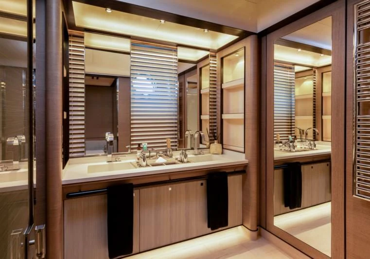 a bathroom with a large mirror aboard ASAHI Yacht for Sale