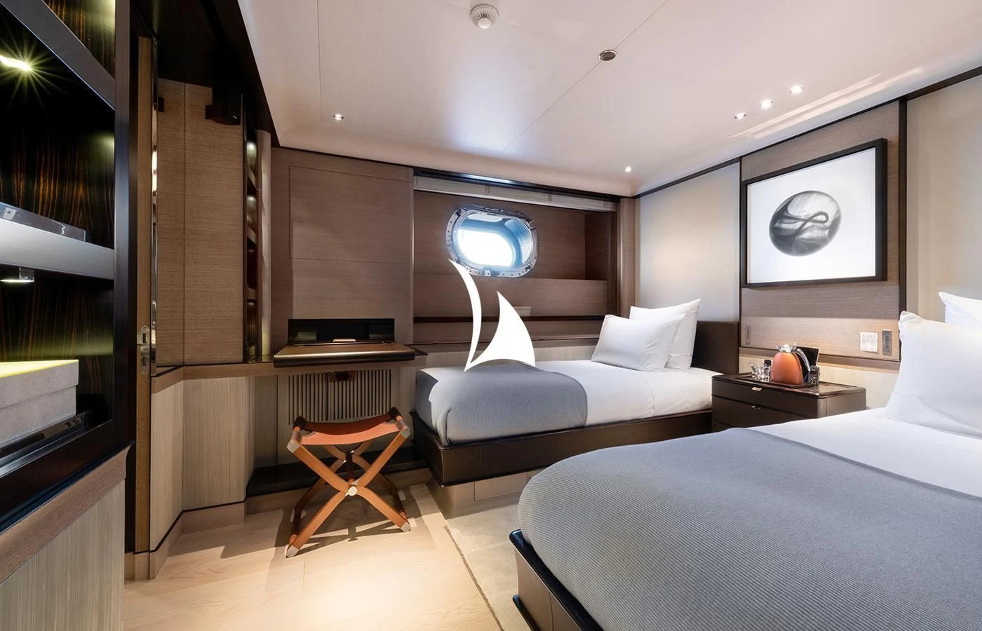 a room with a bed and a television aboard ASAHI Yacht for Sale
