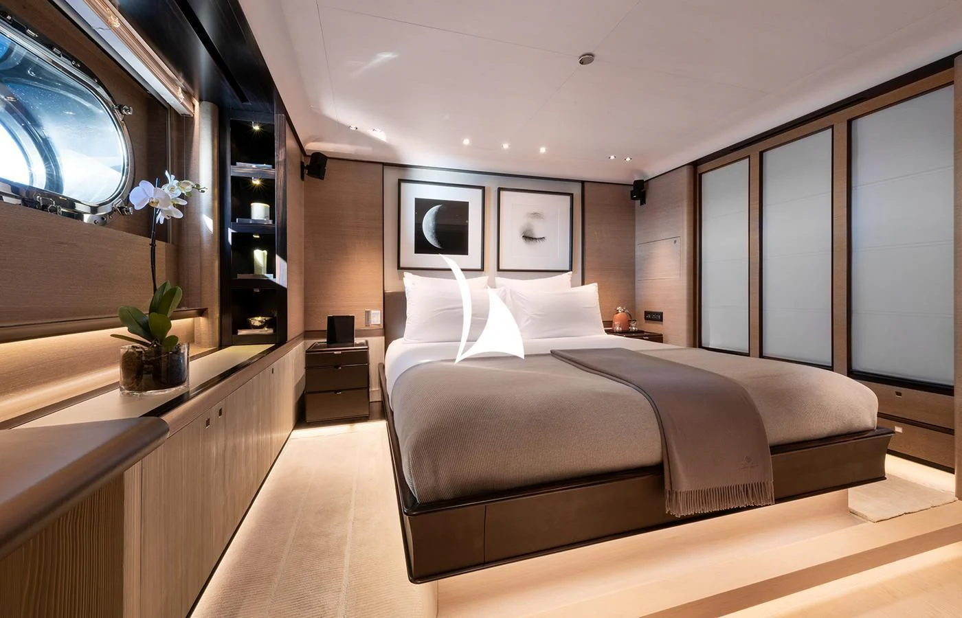 a large bedroom with a large bed aboard ASAHI Yacht for Sale