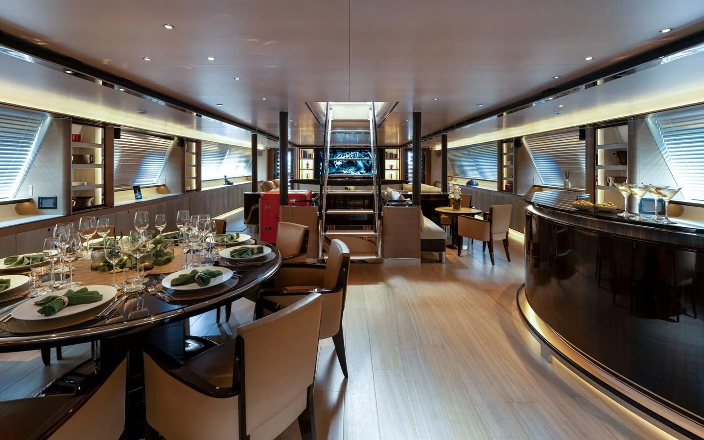 a large dining room with a large kitchen and dining area aboard ASAHI Yacht for Sale