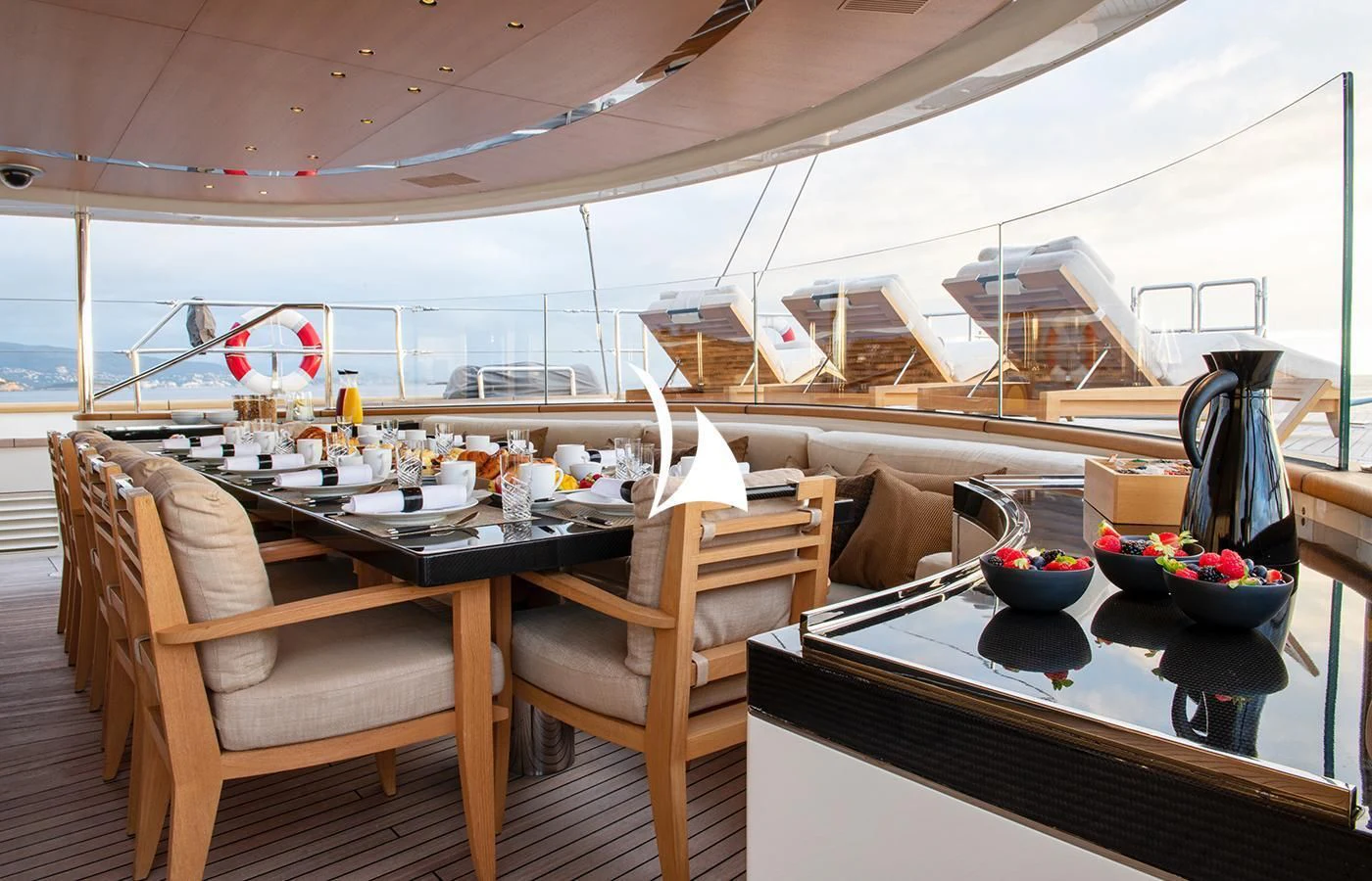 a room with a table and chairs aboard ASAHI Yacht for Sale