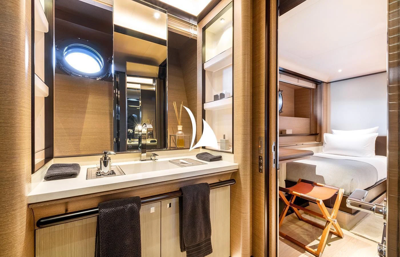 a bathroom with a sink and a mirror aboard ASAHI Yacht for Sale