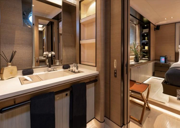 a bathroom with a sink and a mirror aboard ASAHI Yacht for Sale