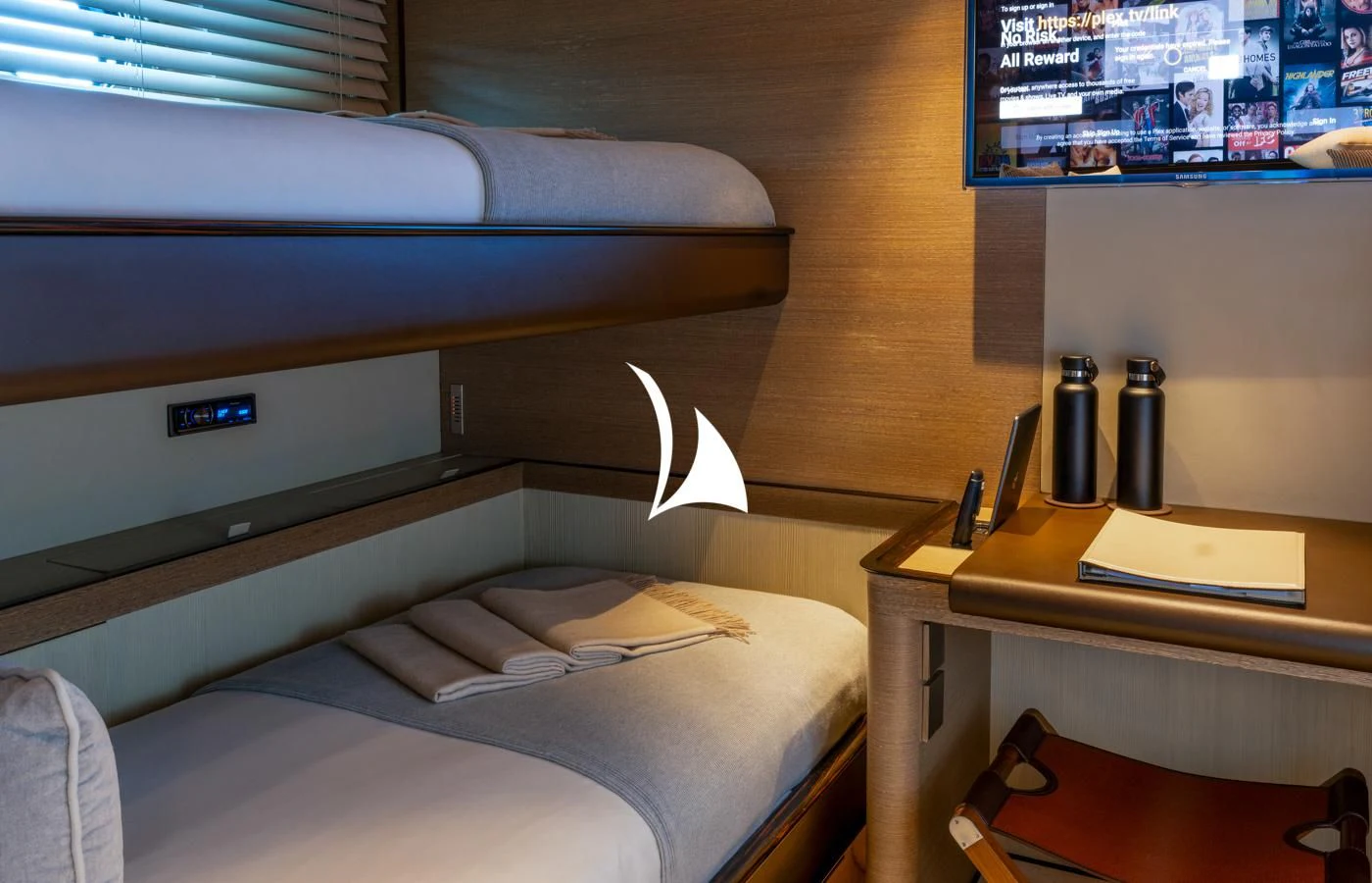 a shelf with a shelf and a bed aboard ASAHI Yacht for Sale
