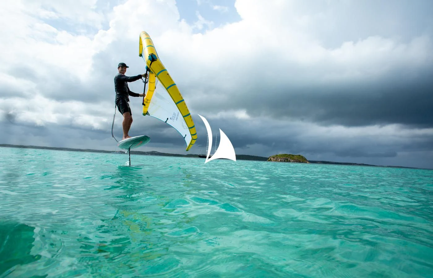 a person on a surfboard in the ocean aboard ASAHI Yacht for Sale