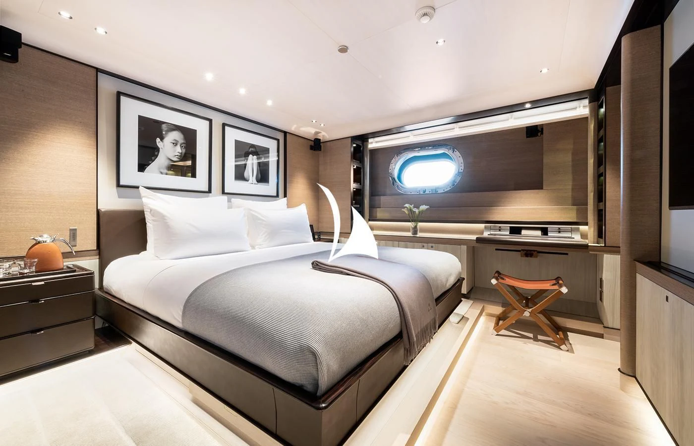 a bed in a room aboard ASAHI Yacht for Sale