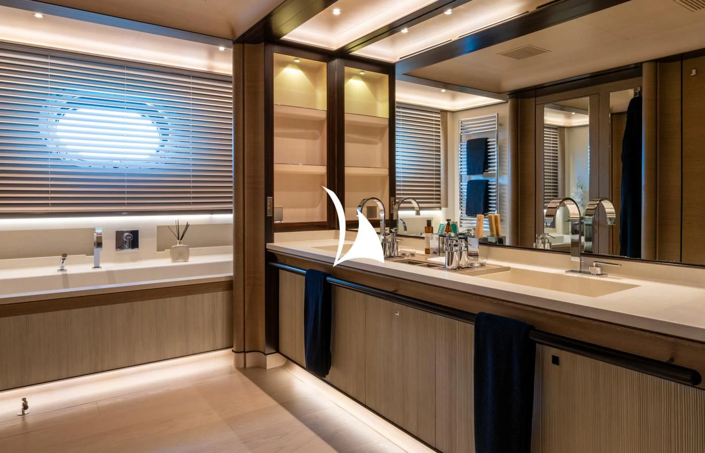 a bathroom with a large mirror aboard ASAHI Yacht for Sale