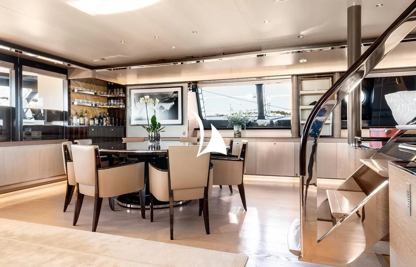a room with a table and chairs aboard ASAHI Yacht for Sale
