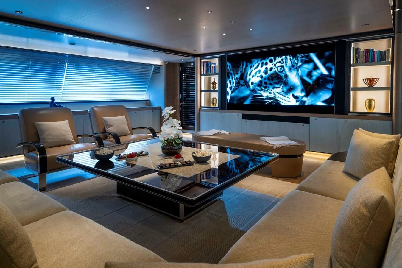 a living room with a large screen aboard ASAHI Yacht for Sale